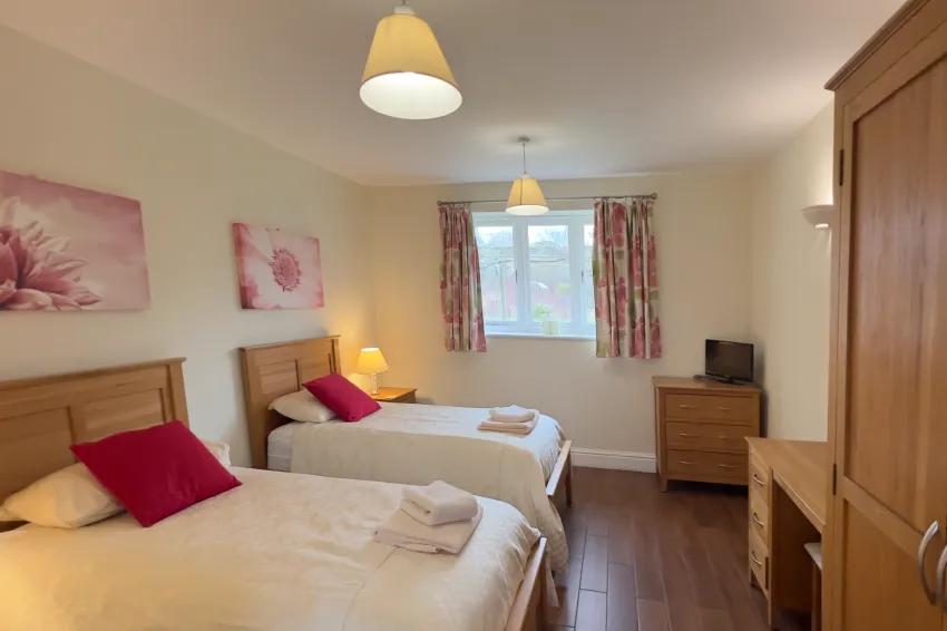 Twin bedroom with all linen providedoom